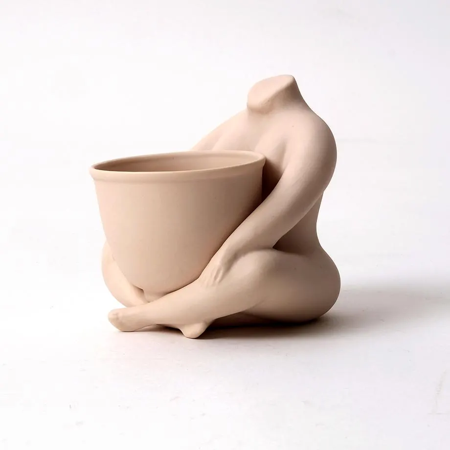 SITTING BURLESK WITH POT ON LAP, image 3