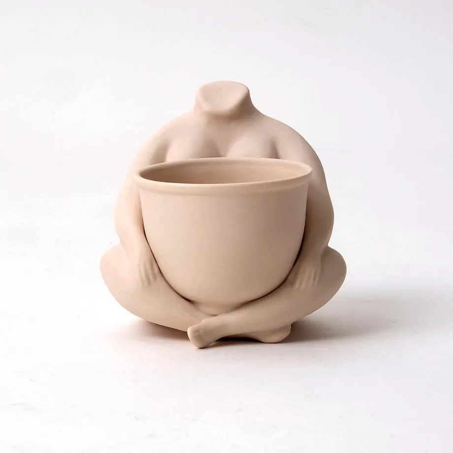 SITTING BURLESK WITH POT ON LAP, image 1